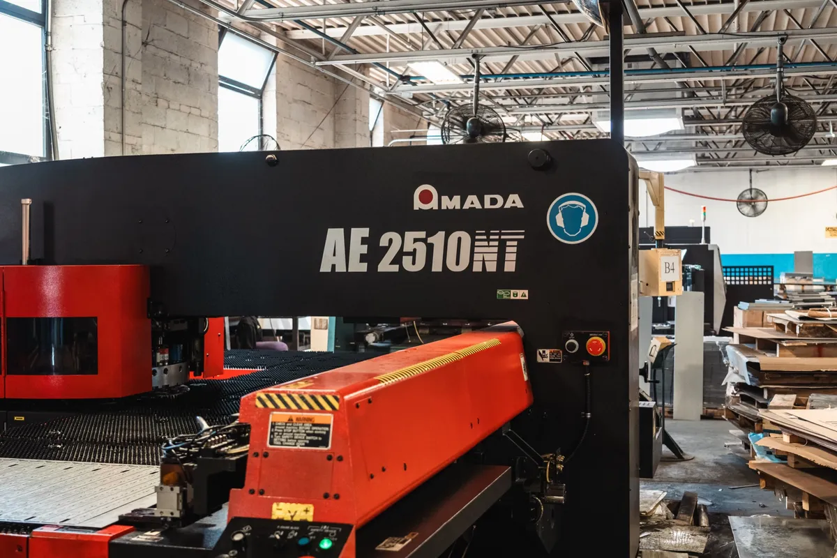 Amada AE 2510NT CNC turret punch with the machine name visible