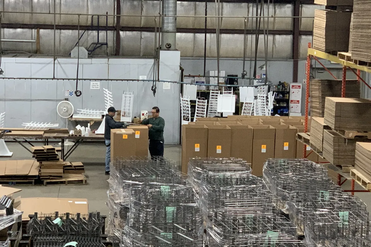 Wrapped pallets of wire displays and cartons ready to ship
