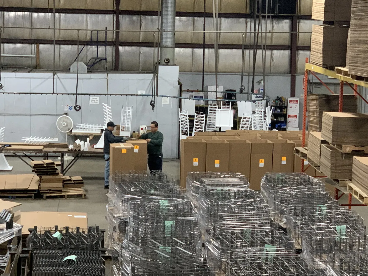 Wrapped pallets of wire displays and cartons ready to ship