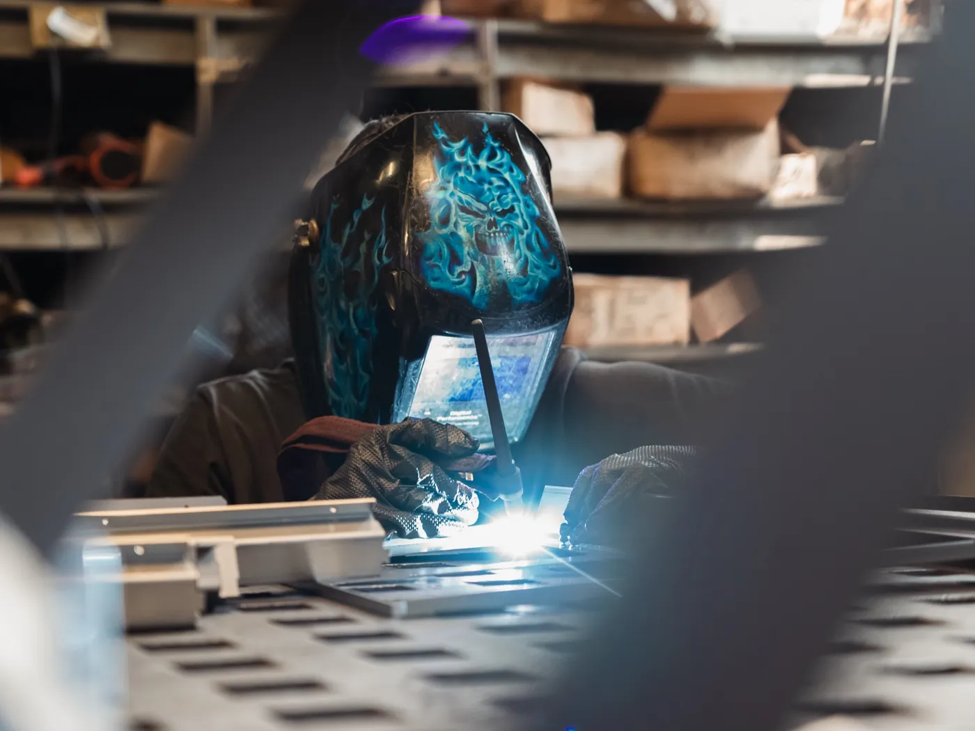 Live welding arc flaring blue-white